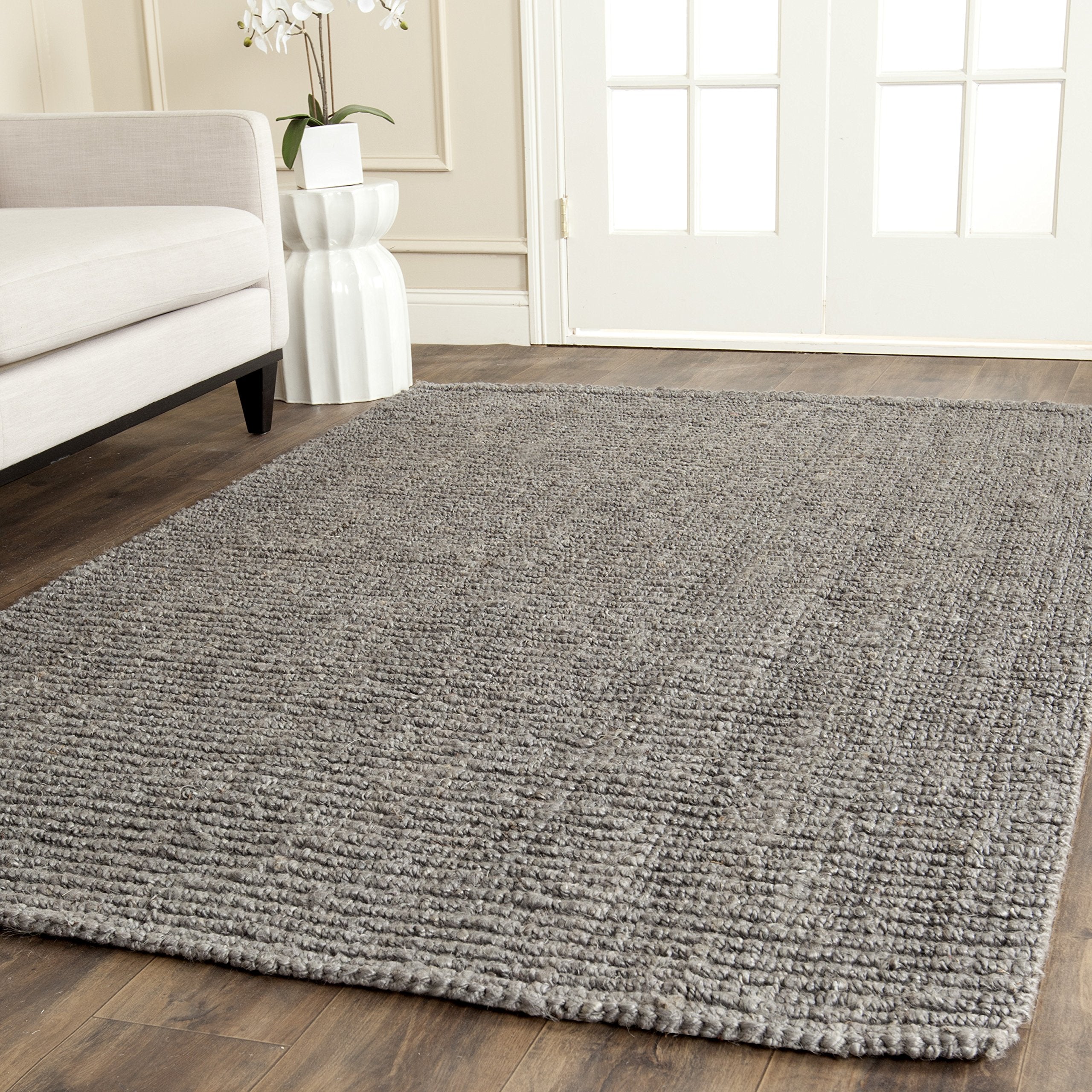 SAFAVIEH Natural Fiber Collection Area Rug - 5' x 7'6", Natural Brown, Handmade Jute, Farmhouse Style, Chunky Textured Thick Pile (NF447A)